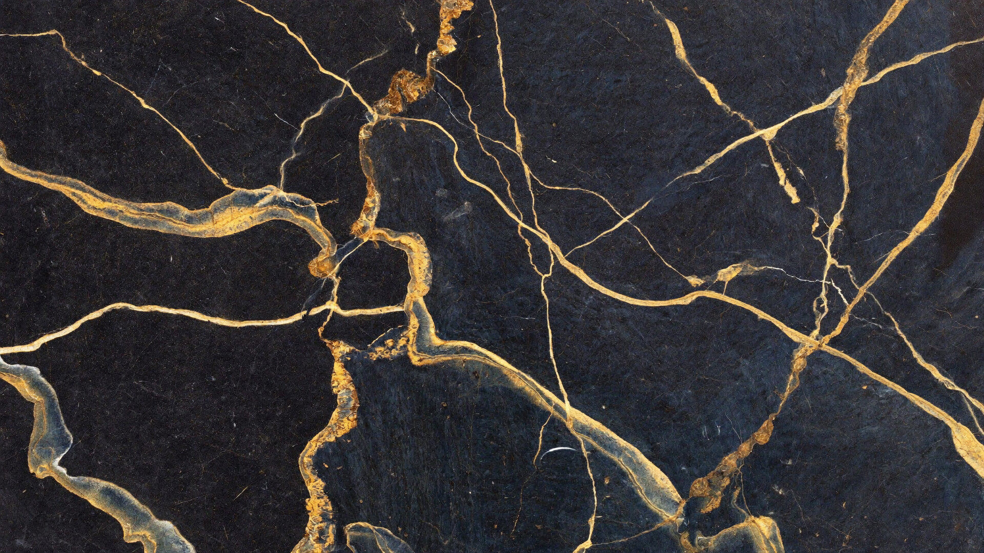 Navy marble with warm gold veining